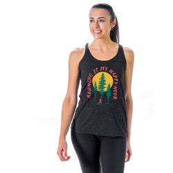 Woman wearing a tank top with a nature-themed happy hour design and text on a white background