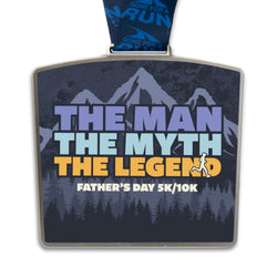 Medal with 'The Man, The Myth, The Legend' text and mountain design on a white background