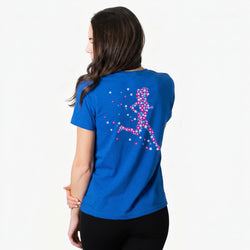 Woman wearing a blue t-shirt with a flower running woman design on the back against a white background