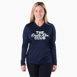 A woman modeling a navy blue long-sleeve V-neck athletic shirt with 'THE Daily Run CLUB' printed in white across the chest, set against a plain light gray background.