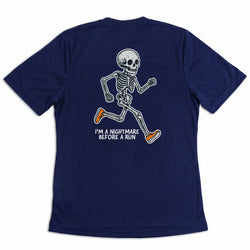 A navy blue short-sleeve t-shirt shown from the back, featuring a white graphic of a running skeleton with orange sneakers and the text 'I'M A NIGHTMARE BEFORE A RUN'.