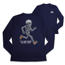 A navy blue long-sleeve athletic shirt shown from both the front and back. The back features a white running skeleton graphic with orange sneakers and the text 'I'M A NIGHTMARE BEFORE A RUN'.