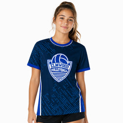 Girl wearing a blue 'Elmwood Volleyball' sports tee on a white background
