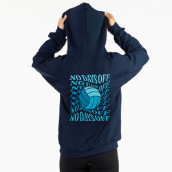 A person viewed from the back wearing a navy hoodie with a large light blue volleyball graphic and repeated 'NO DAYS OFF' text on the back, against a plain light background.
