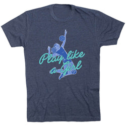 A heather navy blue short-sleeve t-shirt with a graphic of a volleyball player and the text 'Play like a Girl' in light blue and teal, displayed on a clean white background.