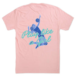 A light pink short-sleeve t-shirt shown from the back, featuring a graphic of a volleyball player in blue and teal text that reads 'Play like a Girl'.