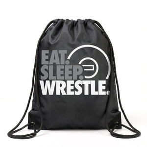 Black drawstring bag with 'Eat Sleep Wrestle' text on a white background