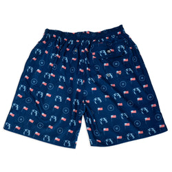 Navy blue swim shorts with a pattern of wrestlers and flags on a white background