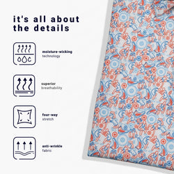 Fabric with a colorful wrestling pattern and text highlighting features like moisture-wicking, breathability, stretch, and anti-wrinkle technology.