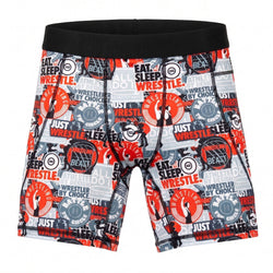 Wrestling-themed spandex shorts with red, black, and gray design on a white background