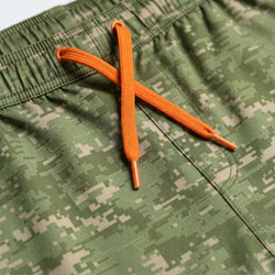 Orange drawstring on a green camouflage-patterned shorts