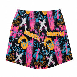 A pair of women's athletic shorts featuring a vibrant, all-over wrestling-themed graphic print on a black base. The pattern includes bright pink and blue paint strokes, yellow 'WRESTLE' text, white silhouettes, and graffiti-style details.