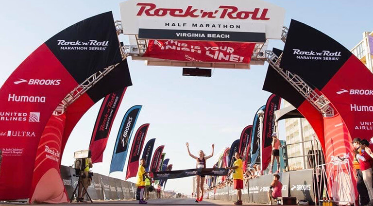 Megan Winning Virginia Beach Half Marathon