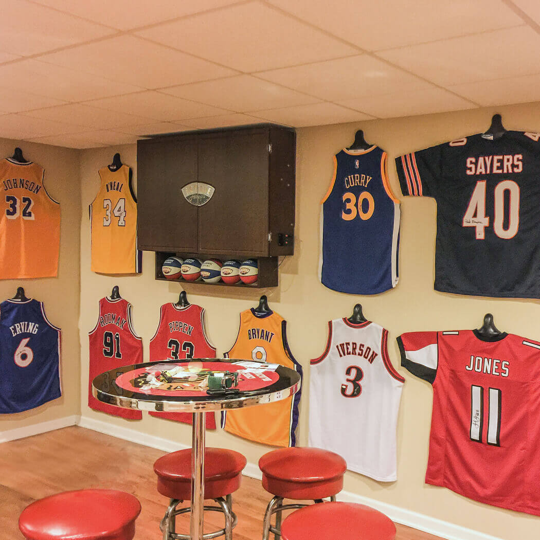hanging up jerseys on wall