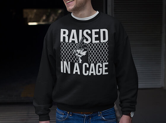 Guy Wearing Raised In A Cage Crewneck Sweatshirt